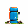 Compact rolled sleeping bag on white background